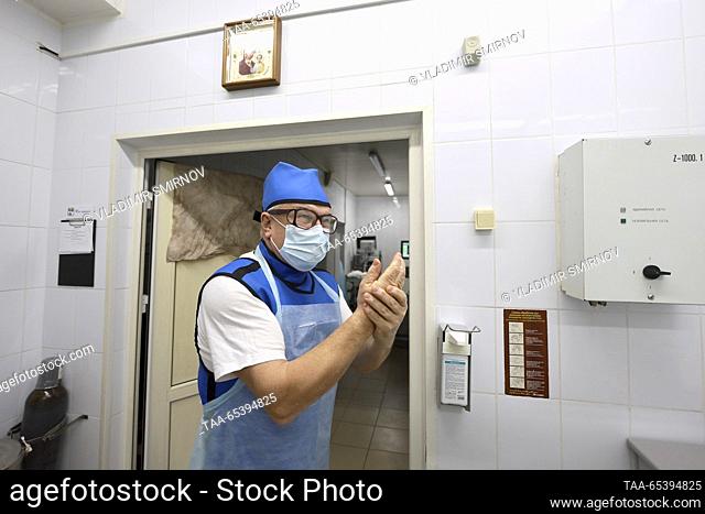 RUSSIA, IVANOVO - NOVEMBER 30, 2023: Yevgeny Varentsov, head of the urology department, prepares to perform a lithotripsy using thulium fibre laser at City...