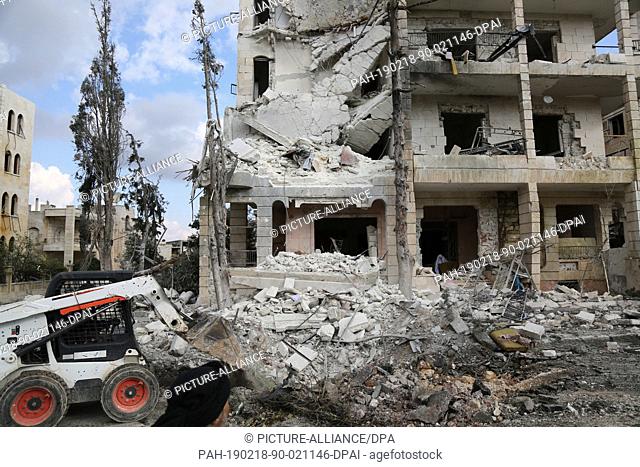 18 February 2019, Syria, Idlib: A damaged building is seen after two bomb blasts in central Idlib. At least 13 people were killed and other 25 people were...