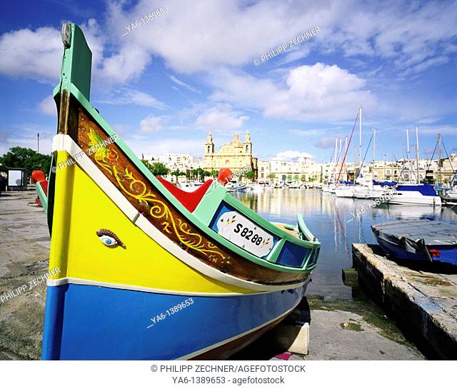 Traditional fisherman boat in the harbour of Msdia, Malta