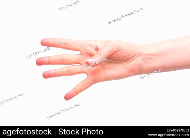 Old woman showing four fingers pointing out on ideas for business projects. Woman#39;s hand and arm are represented over white background