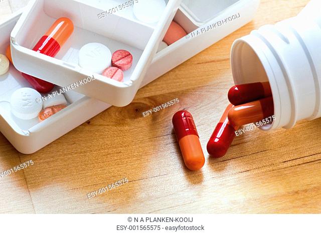 Tablets, capsules and pills sorted in pillbox