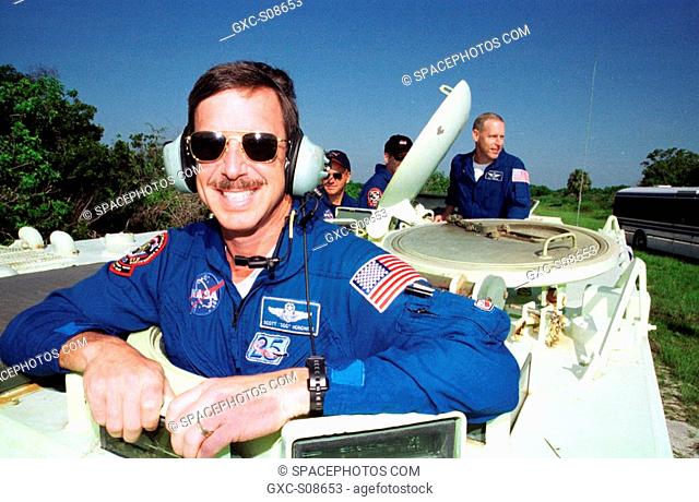 07/18/2001 -- STS-105 Commander Scott Horowitz is ready to take the wheel of the M-113 armored personnel carrier that is part of emergency egress training at...