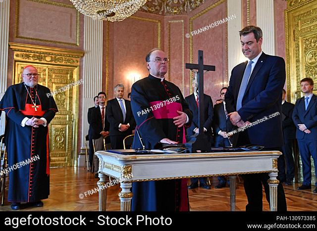 Prime Minister Dr. Markus Soeder and the appointed Bishop of Augsburg, Praelat Dr. Bertram Meier (left) at the swearing in of the Bavarian constitution and the...