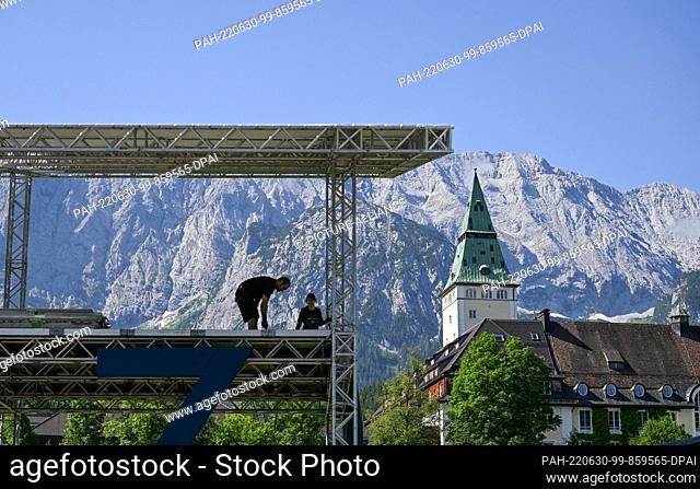 30 June 2022, Bavaria, Elmau: The press grandstand next to Schloss Elmau is dismantled. After the G7 summit, the area around Elmau Castle is cleaned up again