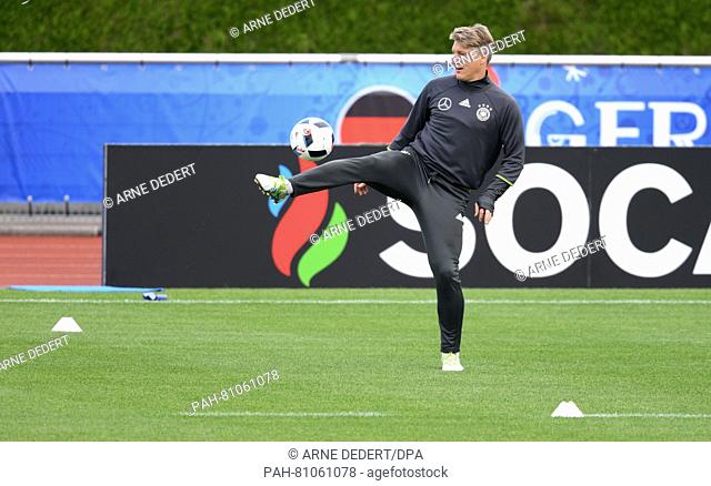 Germany's Bastian Schweinsteiger in action during a training session of the German national soccer team on the training pitch next to team hotel in Evian