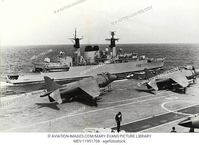 Royal-Navy Rn Bae Sea Harriers Parked on the Flight-Deck with Hms Broadsword Sailing Behind