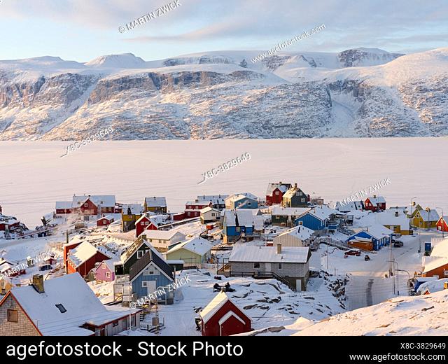 Town Uummannaq during winter in northern Westgreenland beyond the arctic circle. North America, Greenland, Danish territory