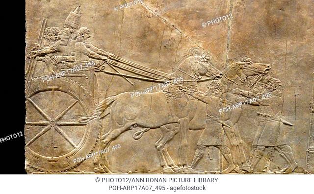 Relief depicting The royal lion hunt. Assyrian, about 645-635 BC From Nineveh, North Palace. Grooms lead horses towards a screened enclosure