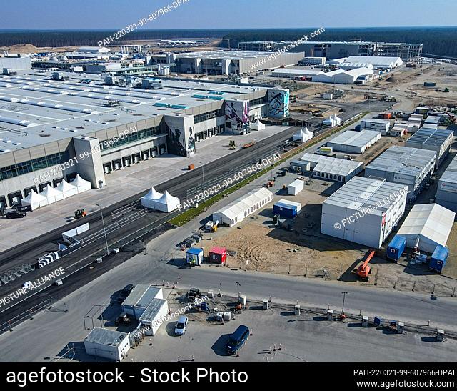 20 March 2022, Brandenburg, Grünheide: The new Tesla Gigafactory Berlin Brandenburg plant (aerial view with a drone). For March 22, 2022, Tesla has invited