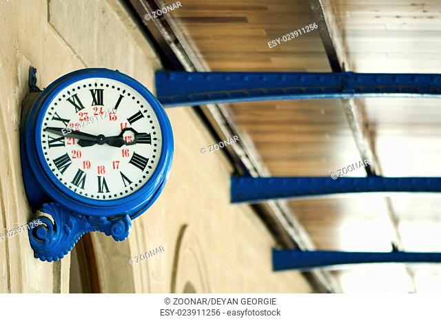 Antique external clock on railway station