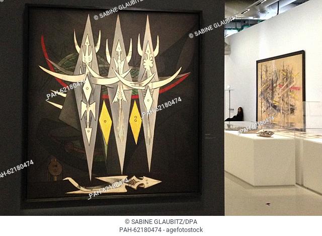 The picture ""Umbral"" (1950) by Wifredo Lam (l), pictured in the Pompidou Centre in Paris, France, 29 September 2015. PHOTO: SABINE GLAUBITZ/DPA | usage...