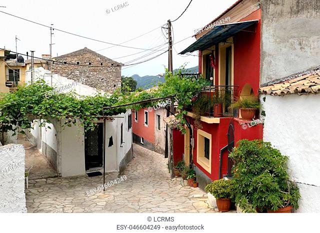 Cityscape of traditional mountain village Liapades at Corfu Island (Greece). View through the streets