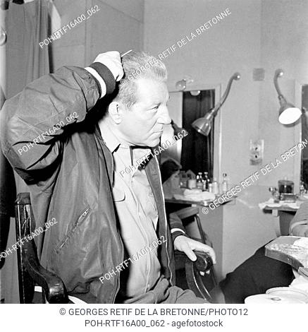 French actor Jean Gabin during a make-up session on the set of a film. c.1956-1957 Photo Georges Rétif de la Bretonne
