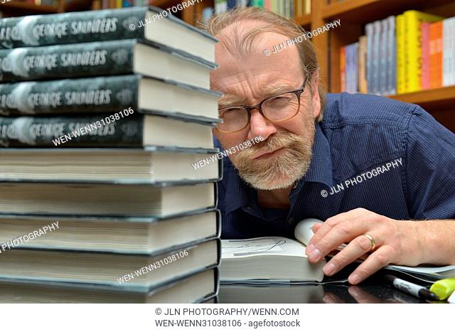 Author George Saunders discusses and signs copies of his new book 'Lincoln in the Bardo' after a reading at Books and Books in Coral Gables Featuring: George...