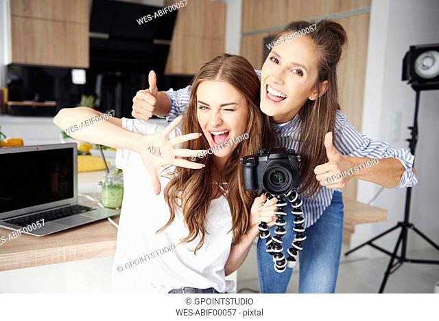Portrait of bloggers having fun