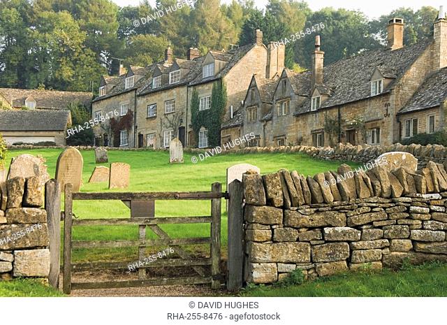 Dry stone wall, gate and stone cottages, Snowshill village, The Cotswolds, Gloucestershire, England, United Kingdom, Europe
