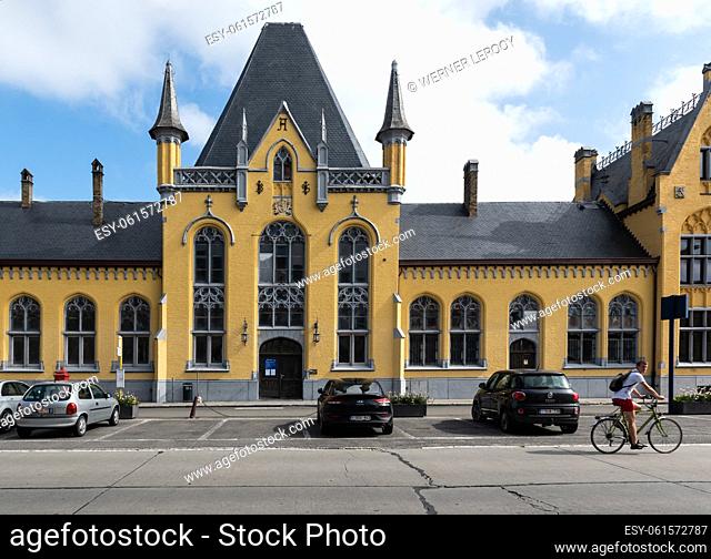 Veurne, West Flanders Region -Belgium. View over the yellow building of the railway station