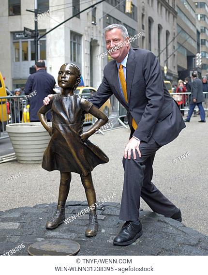 Mayor Bill de Blasio poses with Fearless Girl statue Featuring: Mayor Bill de Blasio Where: Manhattan, New York, United States When: 27 Mar 2017 Credit:...