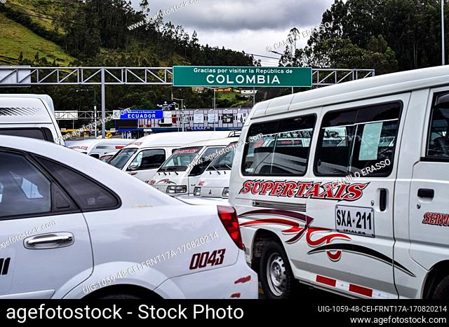 Public transportation vehicles clog the closed bridge that connects the countries of Colombia and Ecuador as drivers of public service vehicles hold protest on...