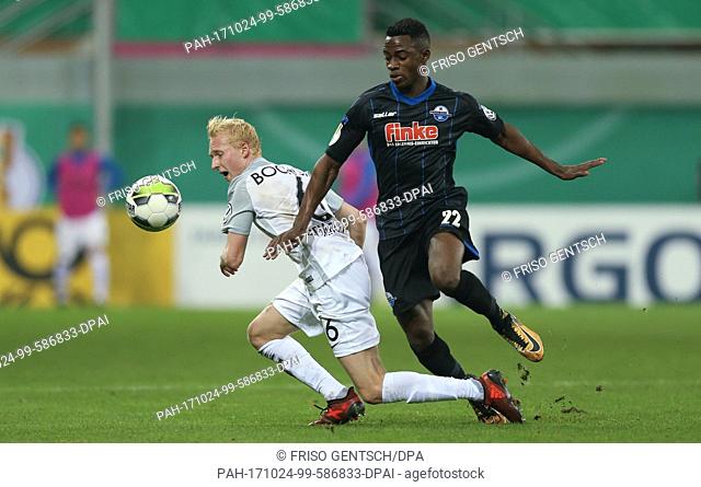 Paderborn's Christopher Antwi-Adjej (R) and Bochum's Luke Hemmerich (L) vying for the ball during the DFB Cup soccer match between SC Paderborn and VfL Bochum...