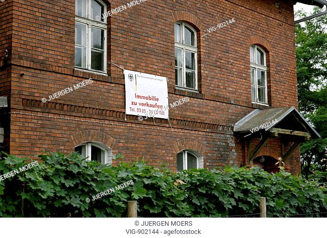 GERMANY, GELBENSANDE, 07.07.2008, To sell sign on a railways station building of Deutsche Bahn with the writing - Bundeseisenbahnvermögen - a special authority...