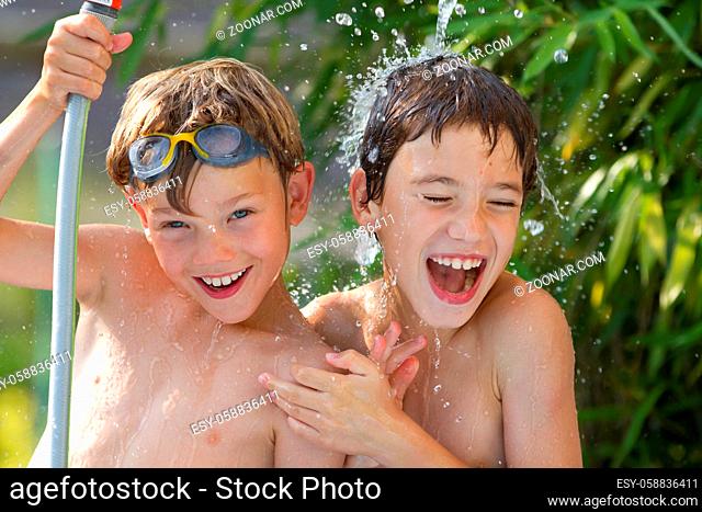 Young children playing in the water
