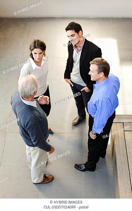 Overhead view of business people talking