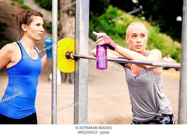 Women relaxing at outdoor gym