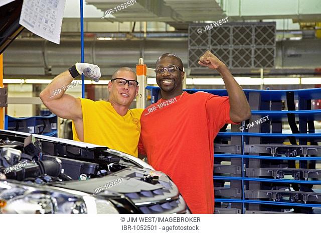 Members of the United Auto Workers on the assembly line for the Chrysler Sebring sedan at Chrysler's Sterling Heights Assembly Plant, Sterling Heights, Michigan