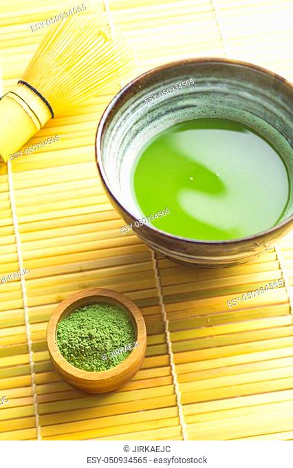 Green matcha tea in bowl