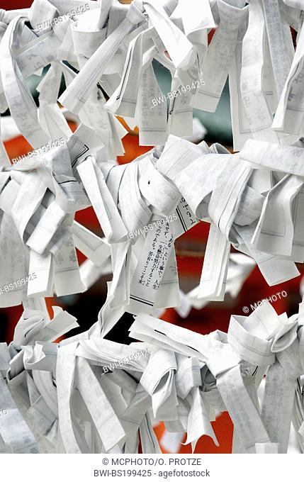 prayer notes lines up in a Shinto temple in Okinawa, Japan