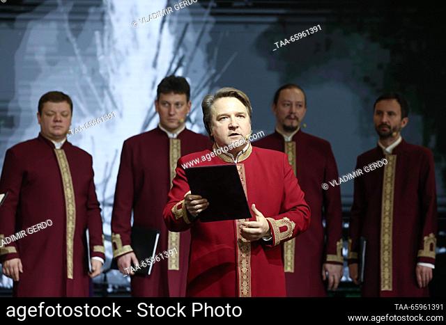 RUSSIA, MOSCOW - DECEMBER 21, 2023: Valaam Monastery Choir performs at the opening of Karelia Republic Day during the Russia Expo international exhibition and...