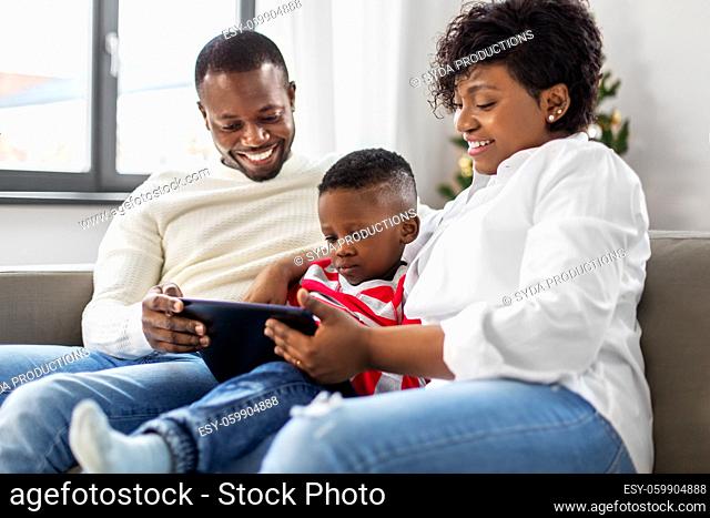 african family with tablet pc on christmas