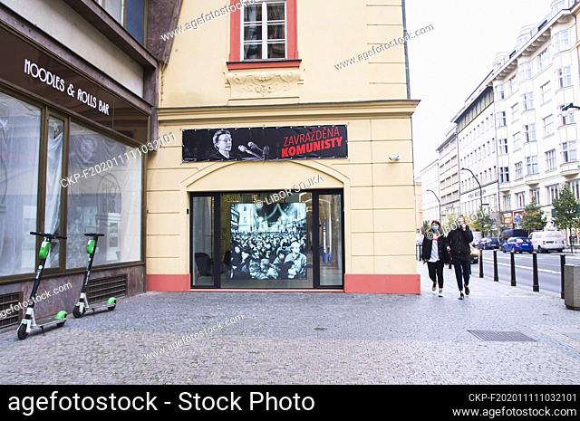The photo of the November 17, 1989, events leading to the fall of communism in a window and a poster with a portrait of the Czech lawyer and democratic...