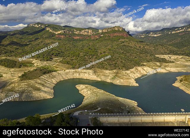 Aerial view of the almost dry PantÃ  de Siurana reservoir during the 2022 drought (Pirorat, Tarragona, Catalonia, Spain)