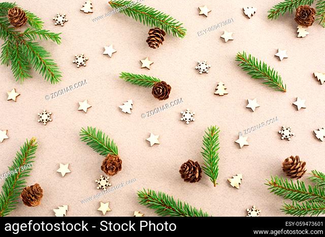 Christmas card light background with wooden decor fir tree branches