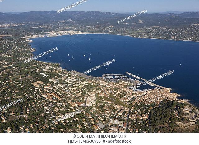 France, Var, Gulf of Saint Tropez, Saint Tropez peninsula, Saint Tropez village, port, luxury yacht (aerial view)