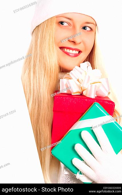 Young blonde girl with gift boxes in Christmas, woman and presents in winter season for shopping sale and holiday brands