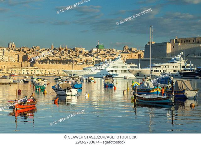 Morning at Vittoriosa Yacht Marina, Malta. Valletta skyline in the distance