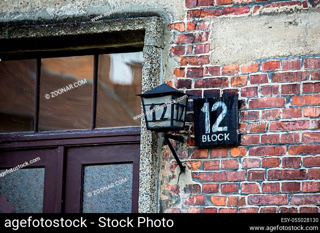 AUSCHWITZ POLAND March 12 2019 Name board and lantern with number 12 at shed block by Concentration Camp. war