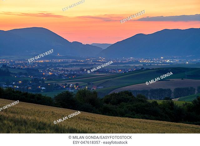 Rural landscape with fields and villages in Turiec region, central Slovakia.