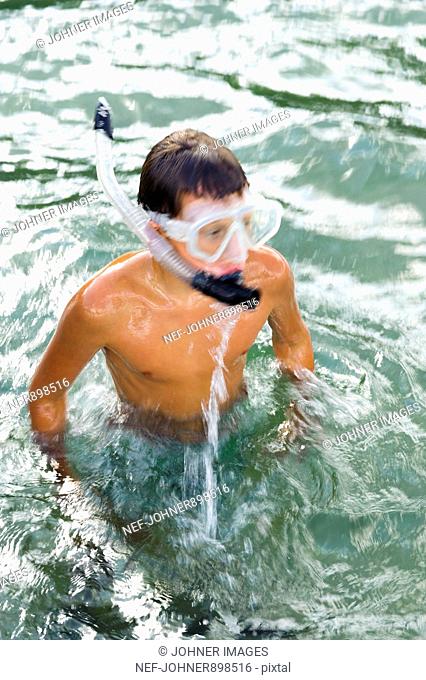 Boy swimming with a cyclops, Sweden