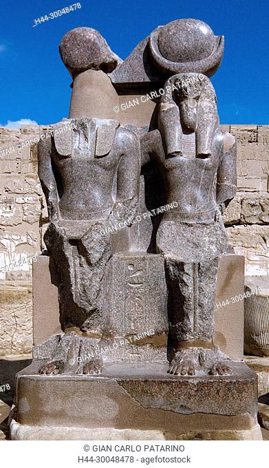 Medinet Habu, Luxor, Egypt, Djamet, mortuary temple of King Ramses III, ( XX dyn. 1185 -1078 B.C) – a double statue of two gods in the hypostyle hall