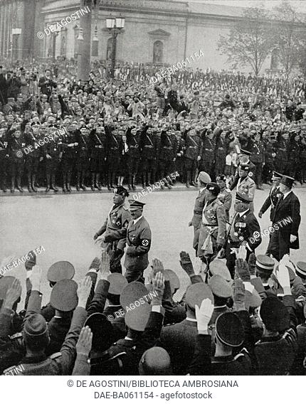 Benito Mussolini (1883-1945) and Adolf Hitler (1889-1945) review the formations of the Nazi Party, Munich, Germany; following: Italian and German Ministers of...
