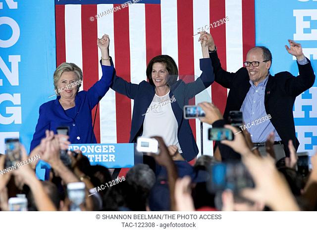 Tom Perez (r) and Catherine Cortez Masto (c) introduce Hillary Clinton to the crowd at the canvass kick off on November 2nd 2016 at the Plumbers and Pipefitters...