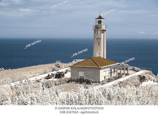 Simulated infrared photo of the lighthouse of Ponta Garça. Sao Miguel island, Azores islands, Portugal