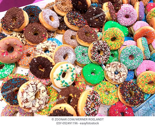 Set of assorted tasty donuts of different colors