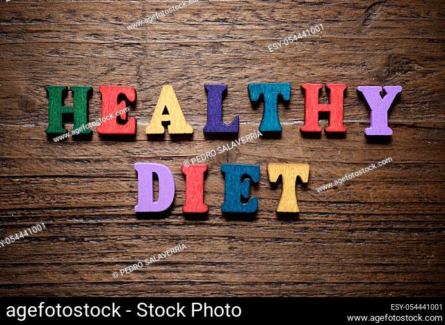 Healthy diet sentence on a wood table