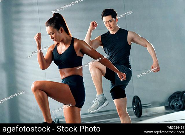 Young people exercise in the gym
