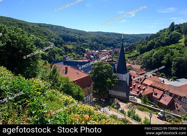 15 June 2022, Saxony-Anhalt, Stolberg: View of the town of Stolberg in the Harz Mountains. In the foreground you can see the roof of St